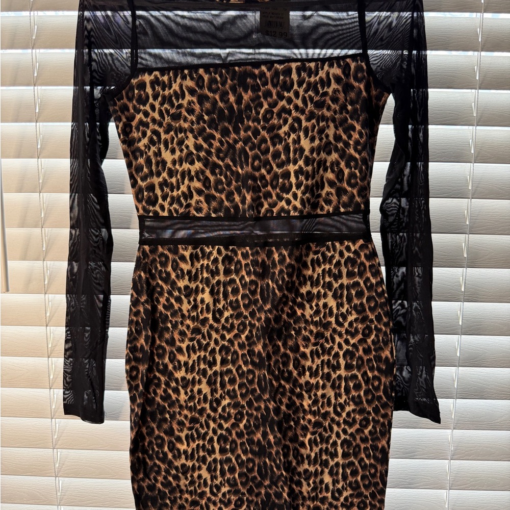 Bozzolo Animal Print Dress with Sheer Black Sleeves